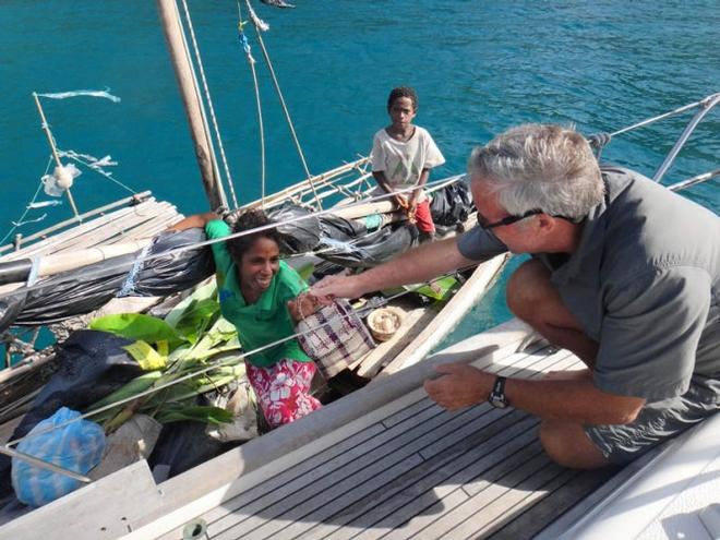 Jim trading with Linda from Brooker Island in Papua New Guinea - Leg five to Itajai -  Volvo Ocean Race 2015 © Bluewater Cruising Association
